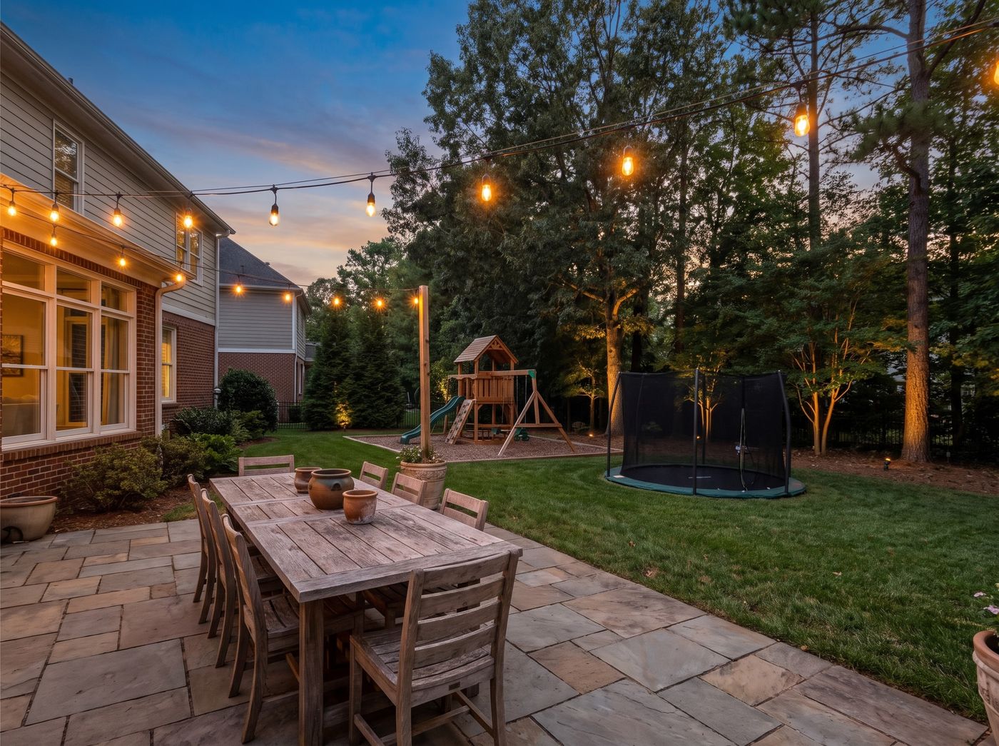 Stone Patio Dining with String Lights