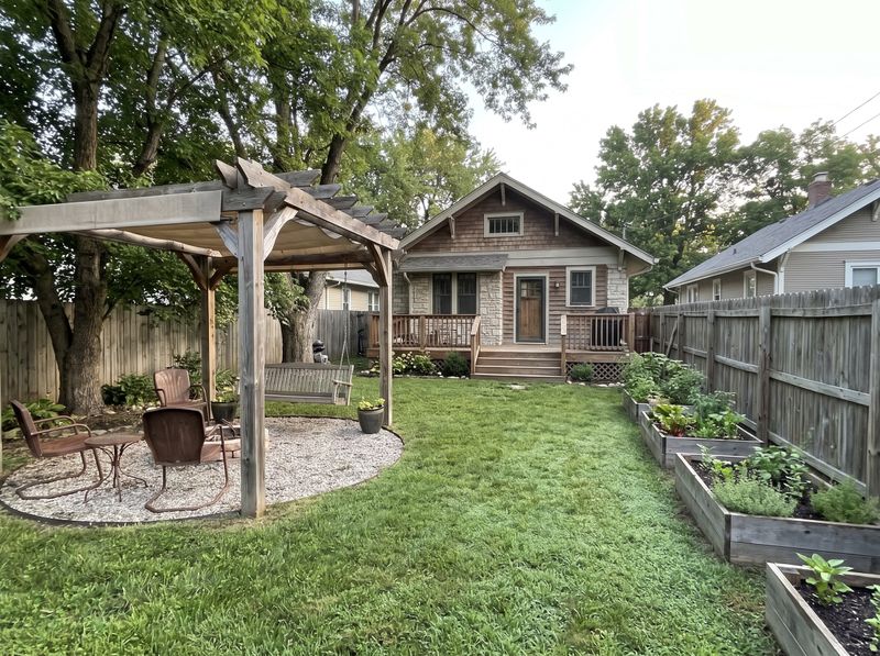 Timber Pergola Beside Raised Beds and Lawn