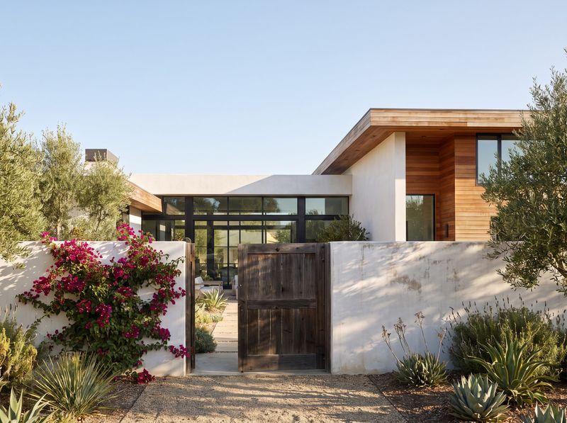 Weathered Timber Gate in Stucco Wall