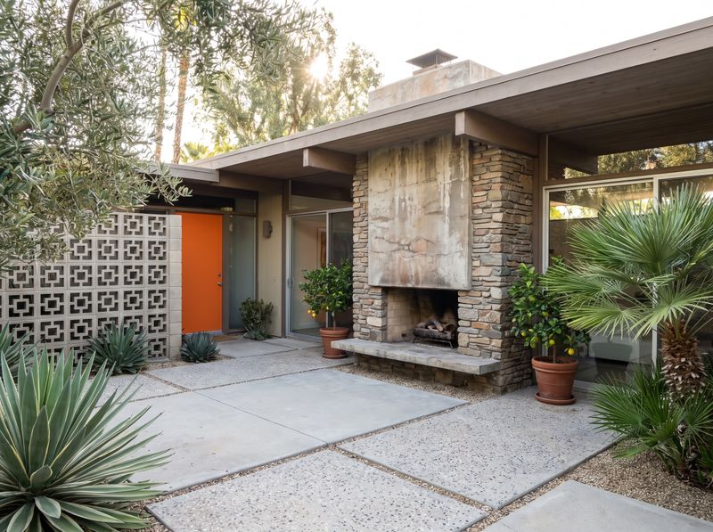 Outdoor Fireplace Framed by Breeze Block Wall