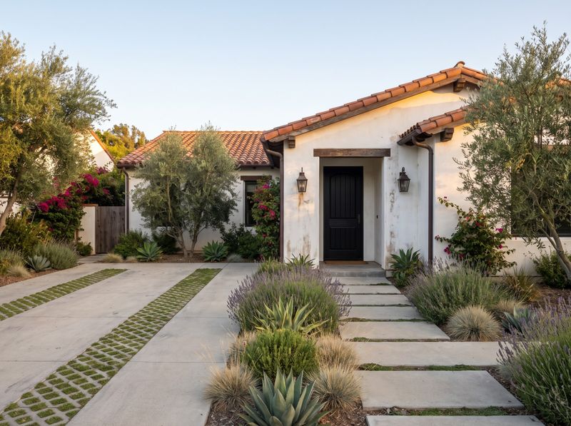 Concrete Paver Walkway Beside Ribbon Driveway