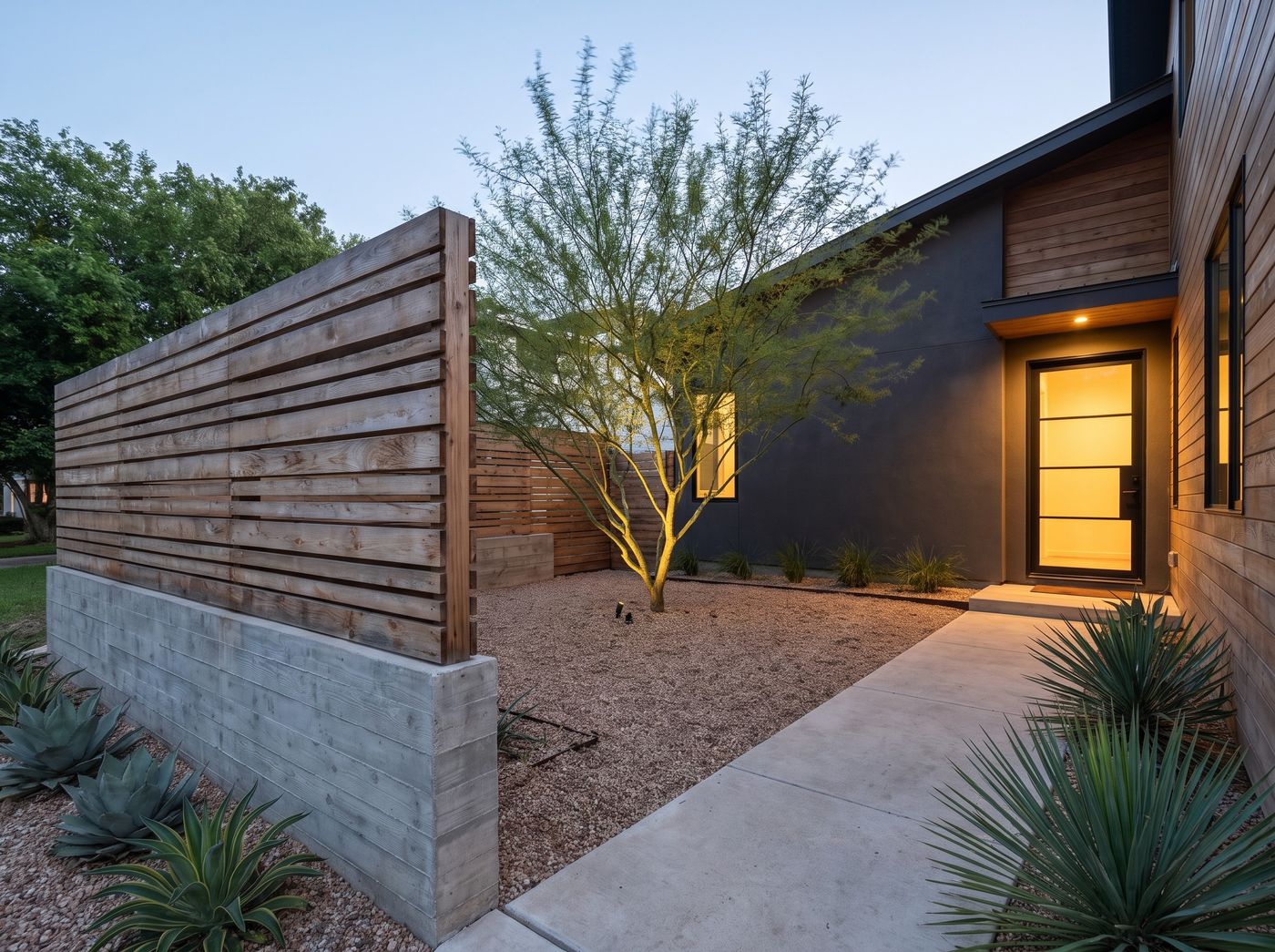 Enclosed Gravel Entry Courtyard with Slat Wall