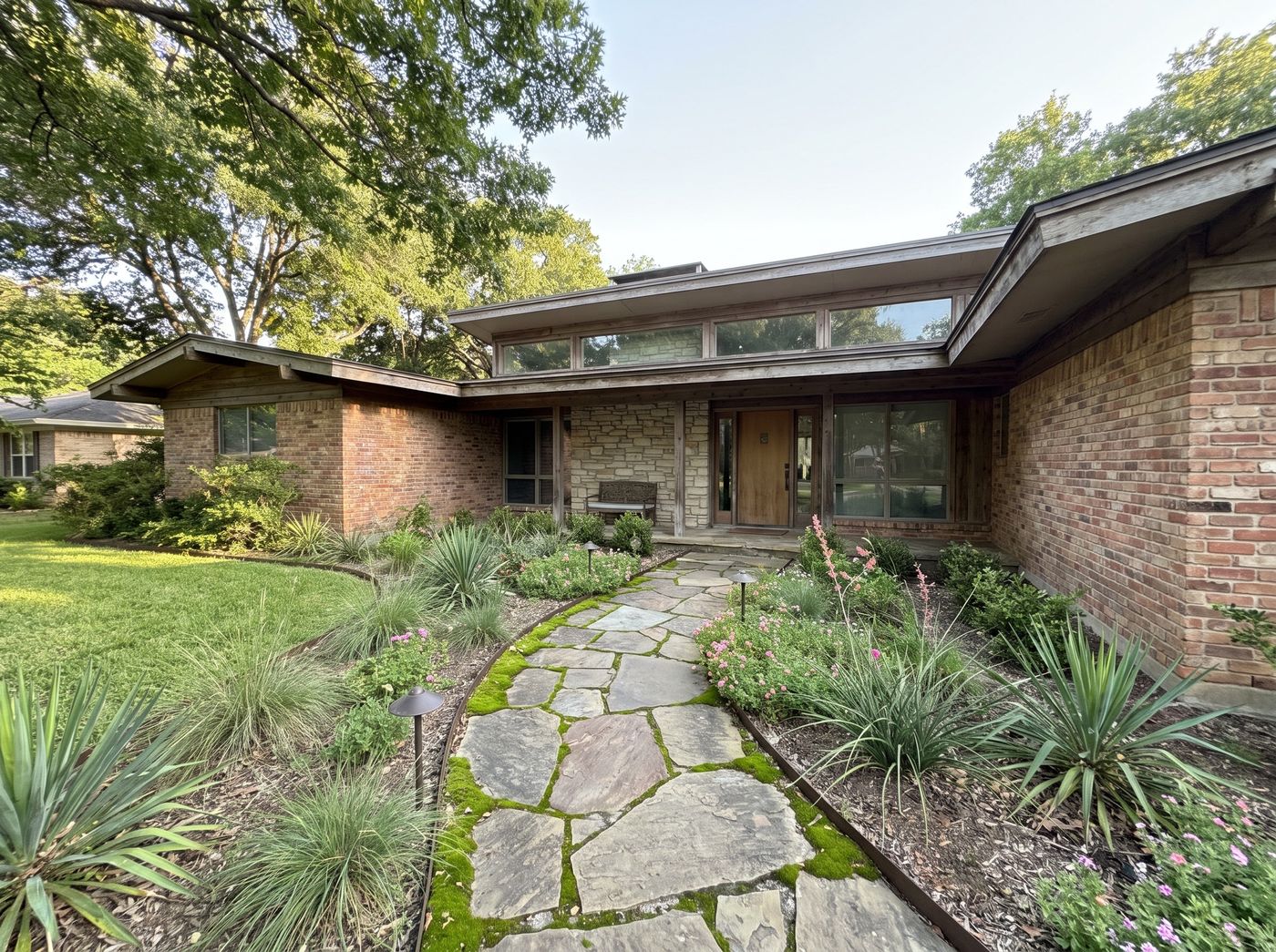 Flagstone Walkway Approaching Sheltered Brick Entry
