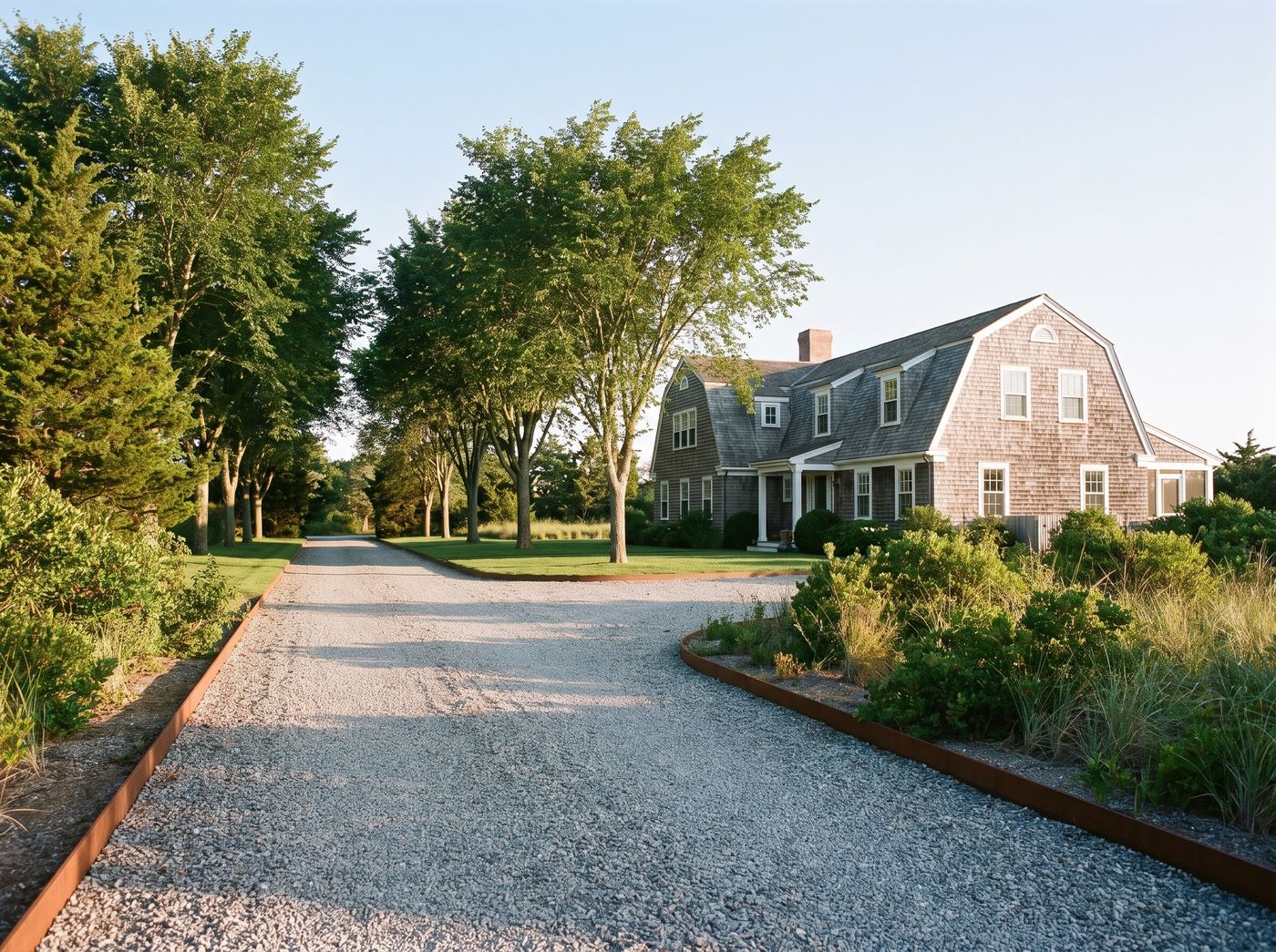 Gravel Driveway Framed by Tree Allée