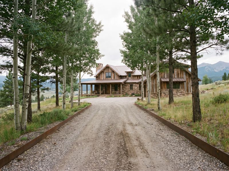 Gravel Driveway Framed by Tree Allée