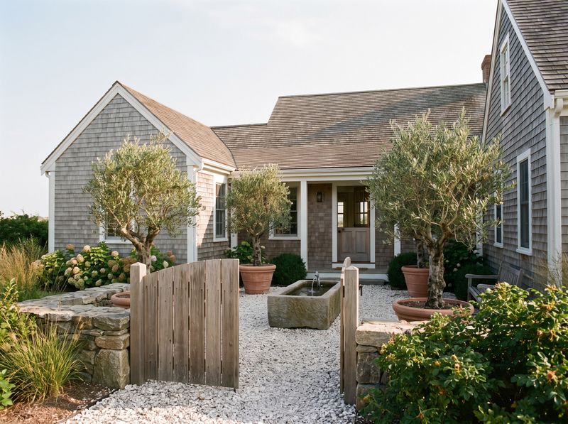 Gravel Entry Courtyard with Stone Fountain