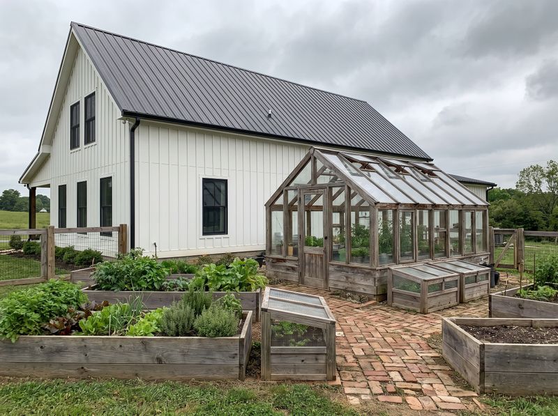 Weathered Timber Greenhouse and Raised Beds