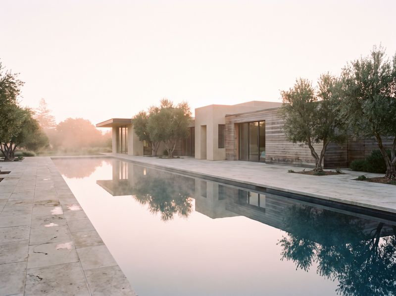 A still geometric lap pool at sunrise