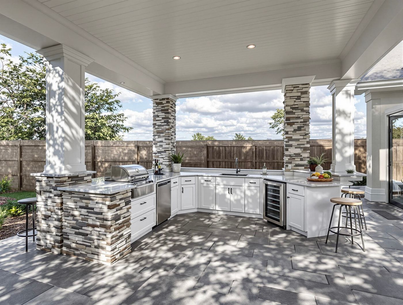 White Kitchen with Mosaic Stone Pillars