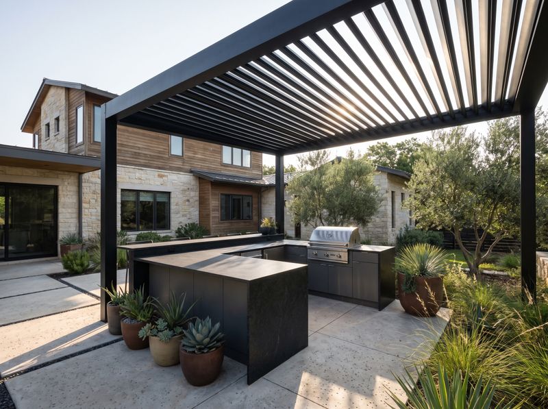 Outdoor Kitchen Beneath Slatted Metal Pergola