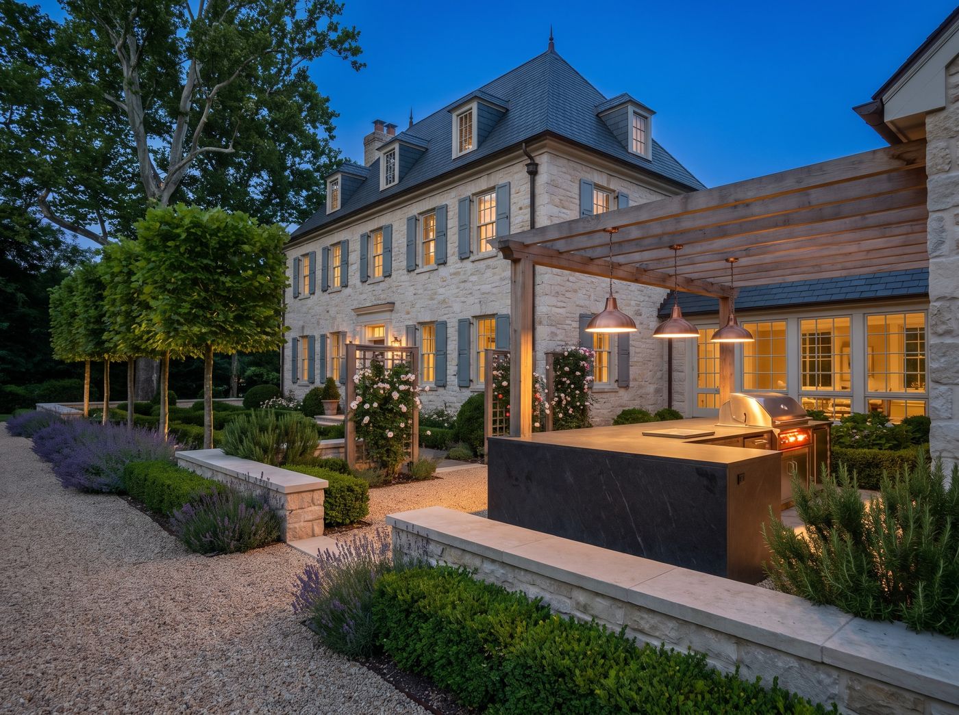 Outdoor Kitchen Island Beneath Timber Pergola