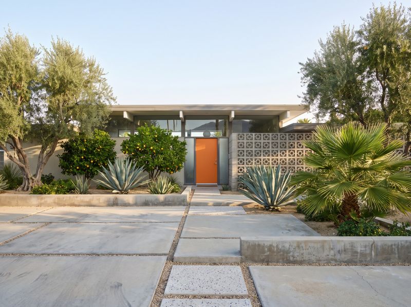 Concrete Walkway Flanked by Breeze Block