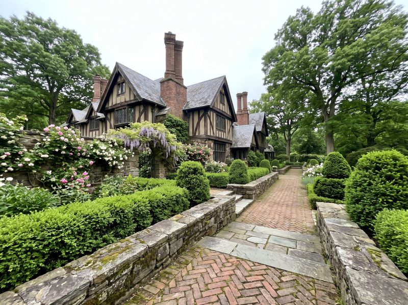 Herringbone Brick Path Beside Tudor Manor