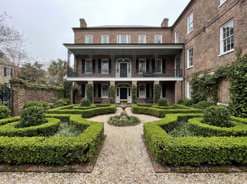 Symmetrical Boxwood Parterre with Stone Fountain
