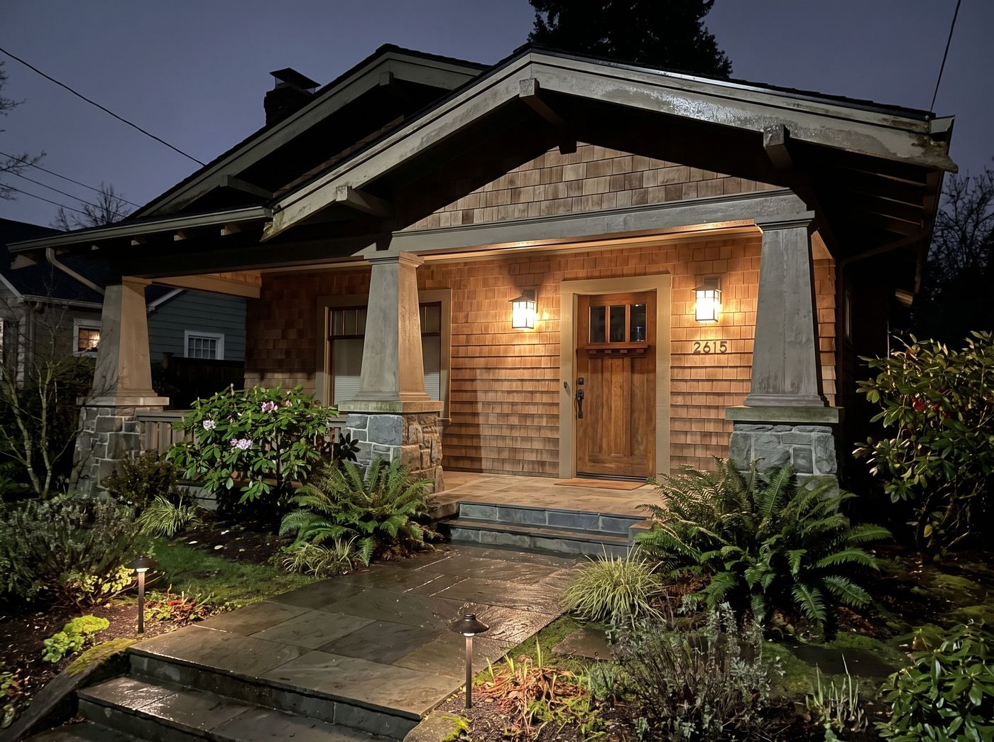 Craftsman Entry with Glowing Lanterns