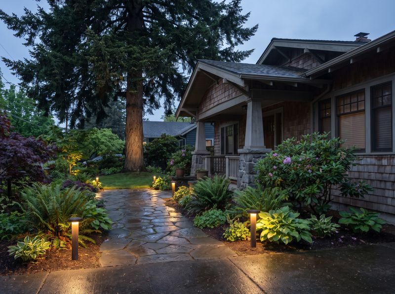 Flagstone Walkway Illuminated by Garden Bollards