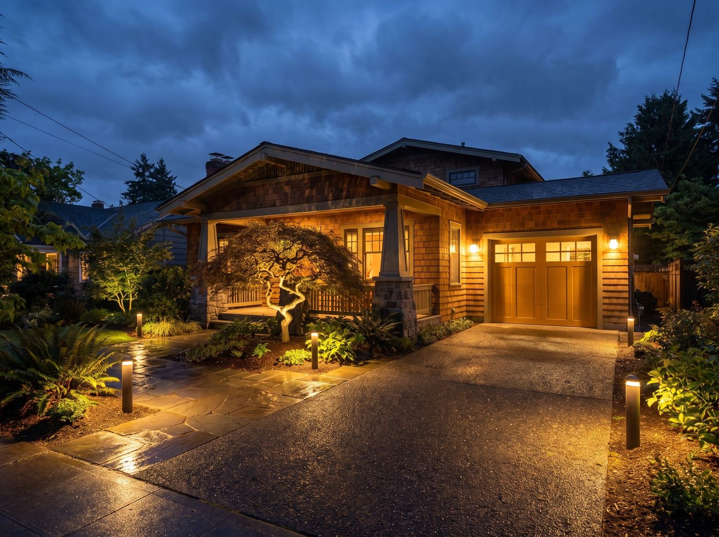 Shingle Façade with Illuminated Driveway