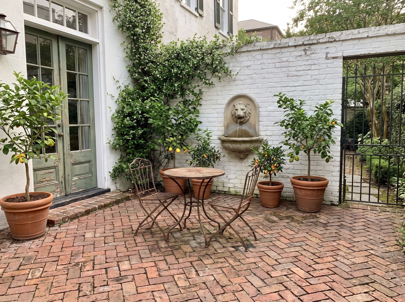 Brick Paver Courtyard with Lion Fountain
