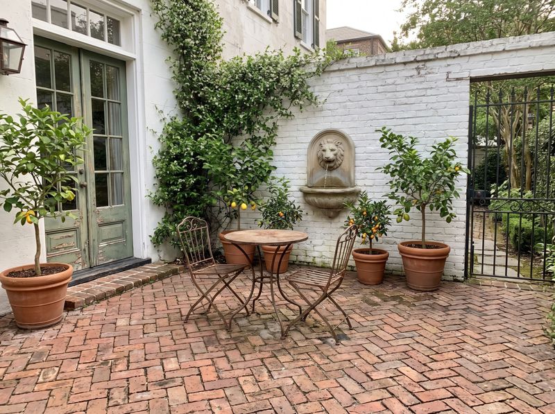 Brick Paver Courtyard with Lion Fountain