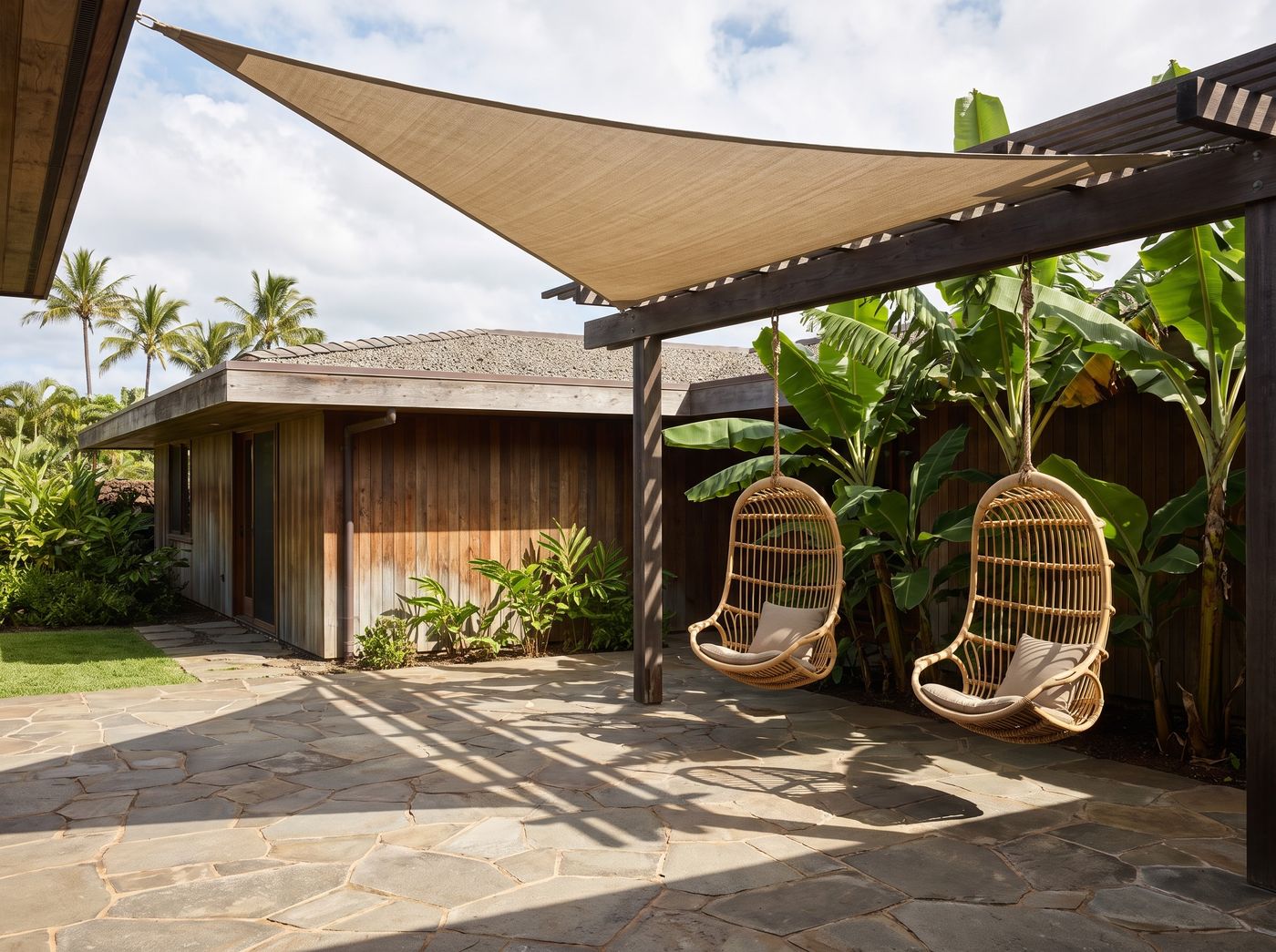 Flagstone Patio with Hanging Rattan Chairs