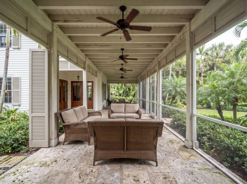 Screened Veranda Patio with Wicker Seating