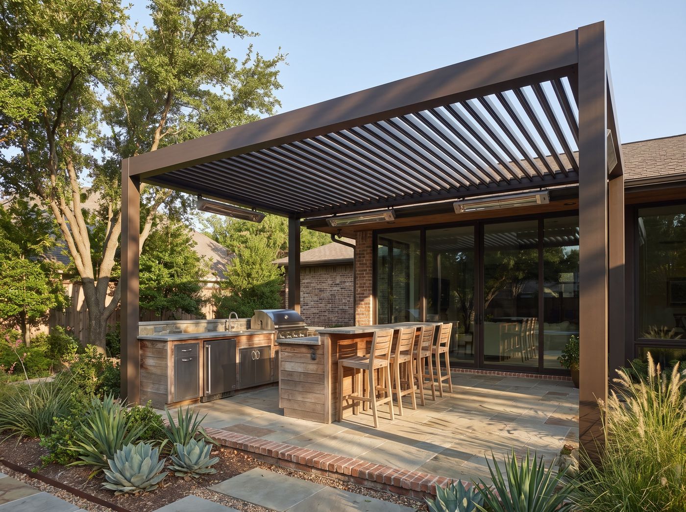 Dark Aluminum Pergola Sheltering Outdoor Kitchen