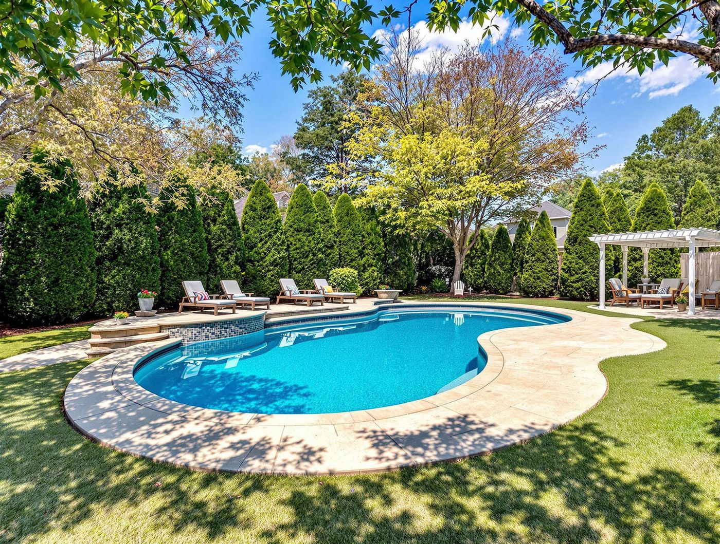 Freeform Pool with White Pergola Lounge