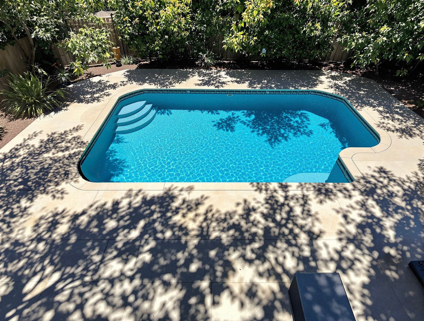 Shaded Lagoon Pool with Curved Steps