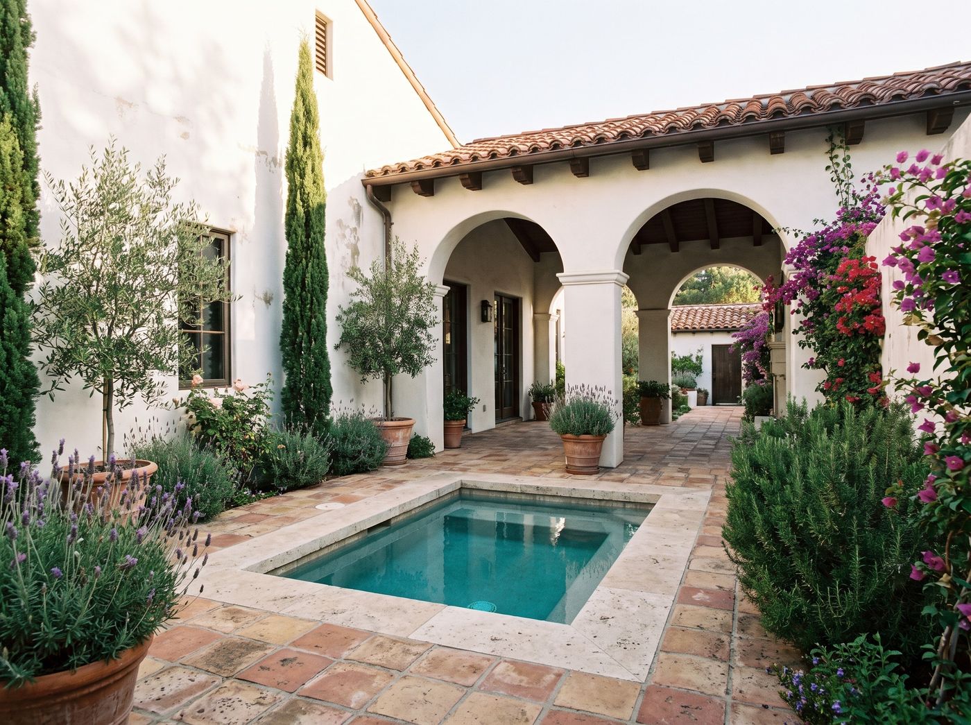 Courtyard Plunge Pool Framed by Arches