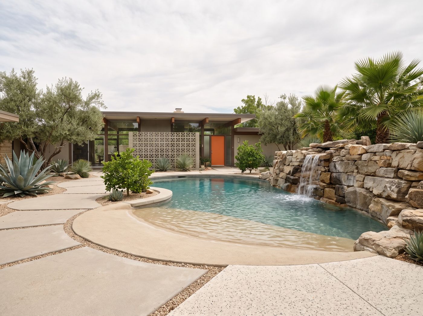 Freeform Pool with Beach Entry and Waterfall