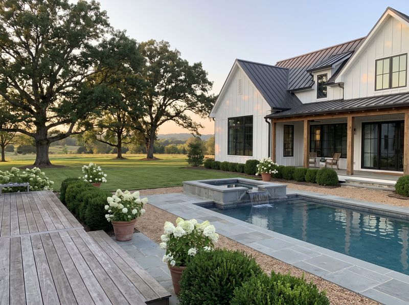 Raised Spa Spilling into Rectangular Pool