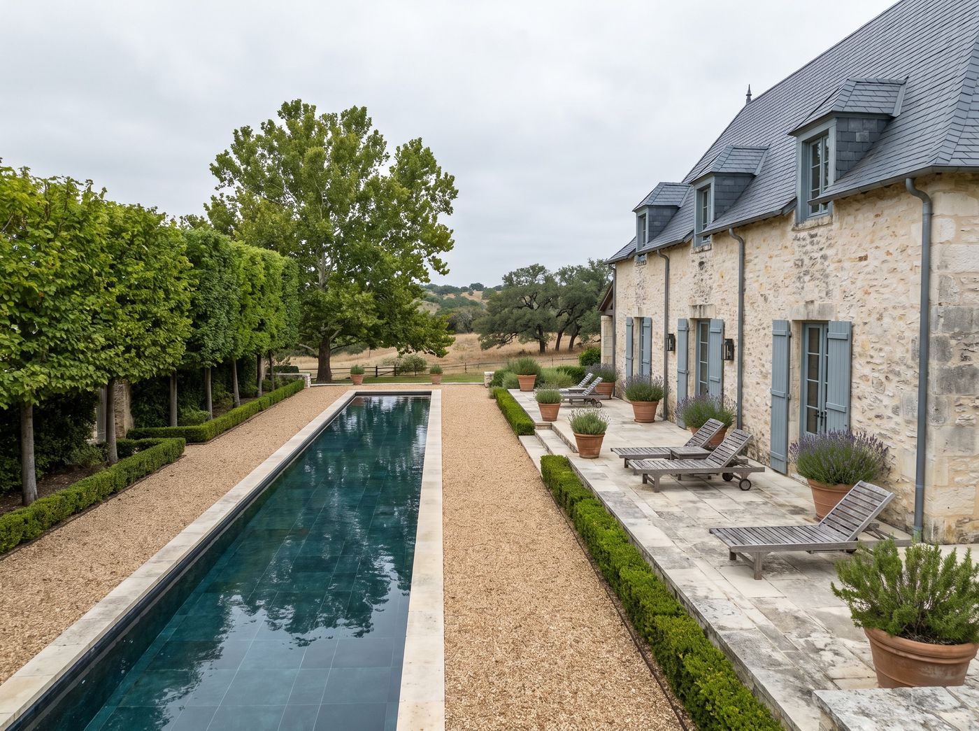 Rectangular Lap Pool Along a Limestone Terrace