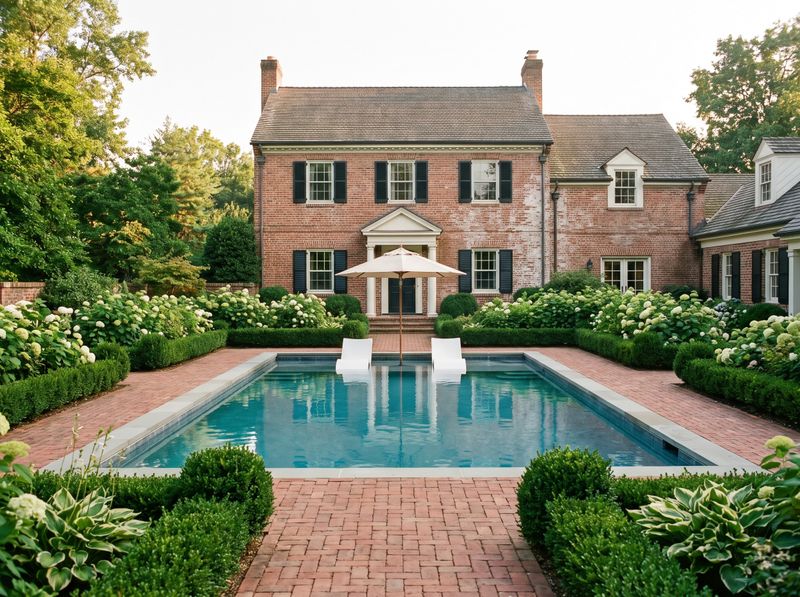 Rectangular Pool Framed by Brick Pavers