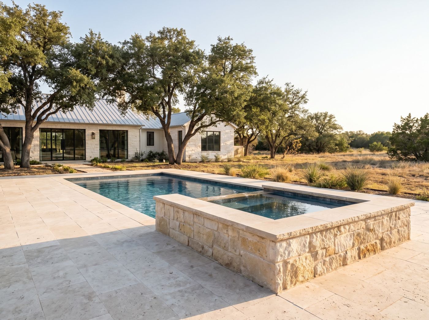 Rectangular Pool with Raised Limestone Spa