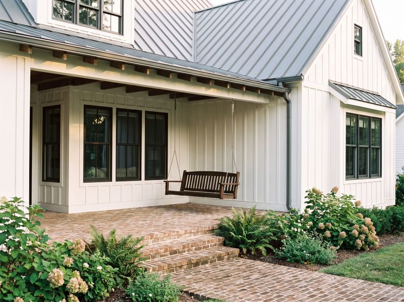 Brick Back Porch with Wooden Swing