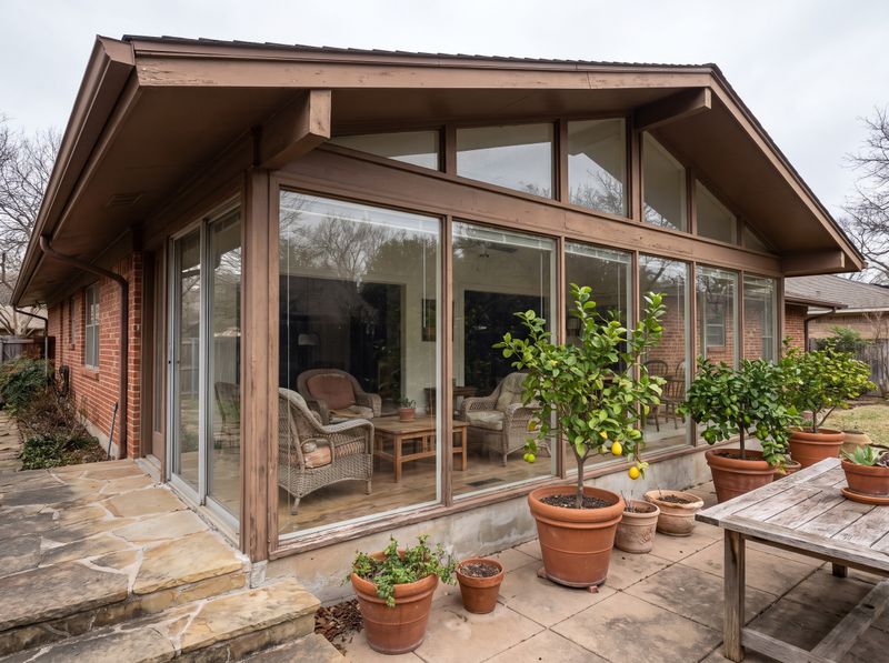 Gabled Sunroom with Expansive Glass Walls