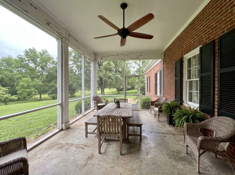 Screened Porch with Timber Dining Table