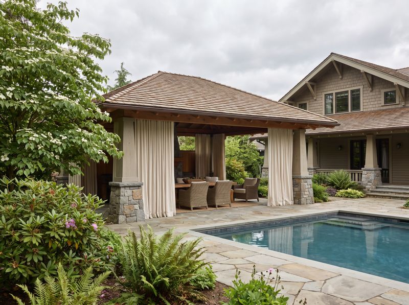 Shingle-Roofed Cabana with Full-Length Curtains